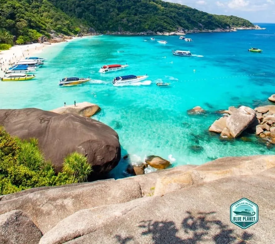 Boats off a beach in the Similan Islands
